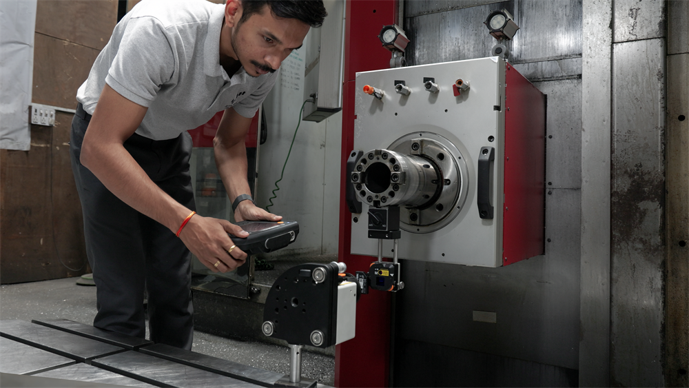 Engineer performing measurements with XK10 alignment laser system