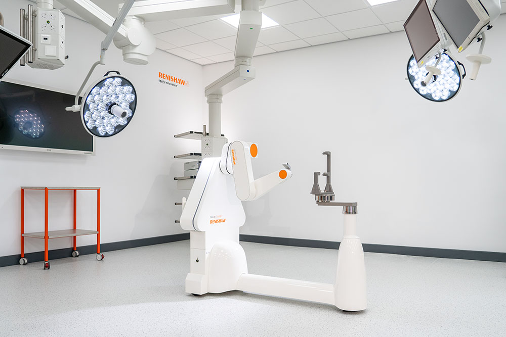 neuromate stereotactic robot under surgical lights in Charfield demo area