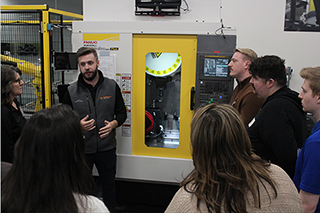 USA training engineer delivering training on how to use QC20 ballbar on Robodrill